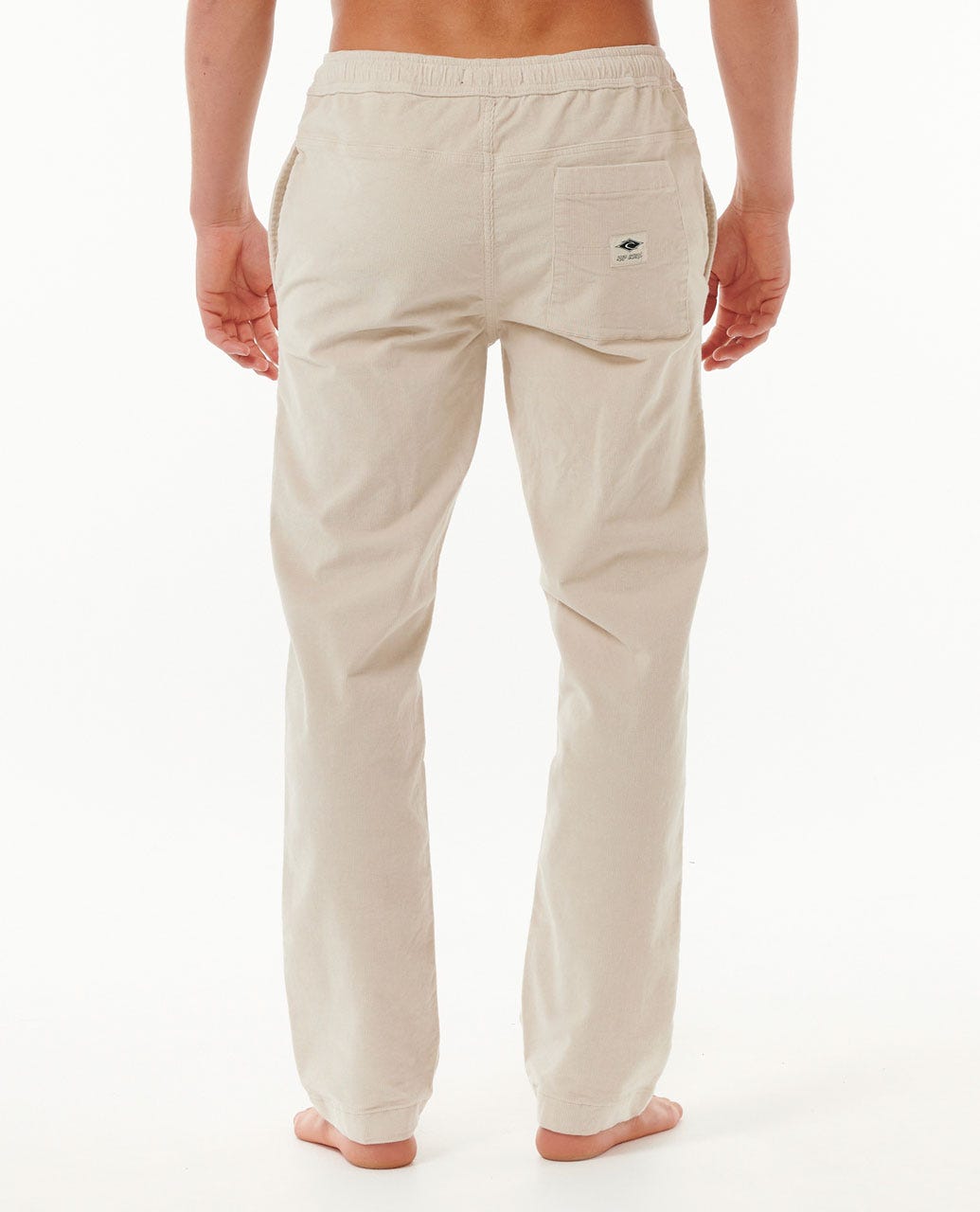 Rip Curl Classic Surf Cord Beach Pant en color crudo, vista trasera con bolsillo trasero y etiqueta Rip Curl