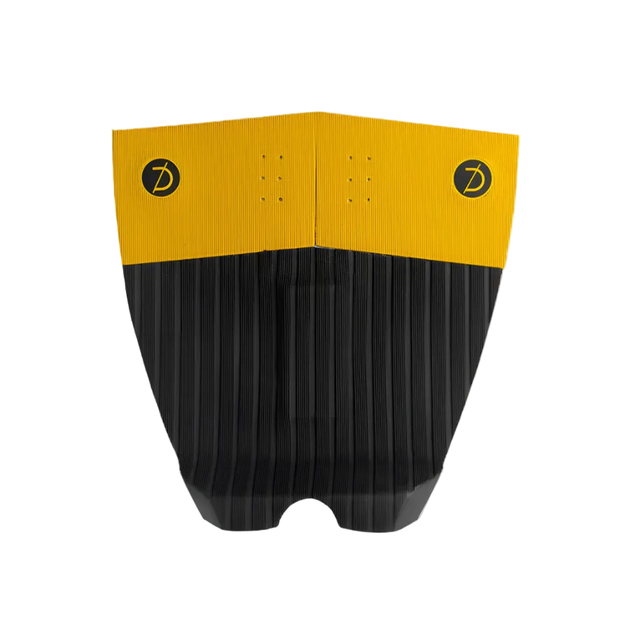 Grip de surf de tres piezas Deflow 3 Piece Traction Vol.2 en color mustard amarillo mostaza cálido, vista frontal con construcción de dos materiales y arco central de 8 mm sobre fondo blanco.