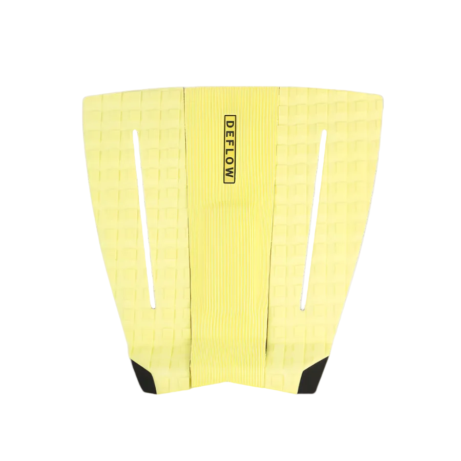 Grip de surf de tres piezas Deflow 3 Piece Pop Traction en color acid lemon amarillo-verde eléctrico, vista frontal con arco central y cubos texturizados sobre fondo blanco.