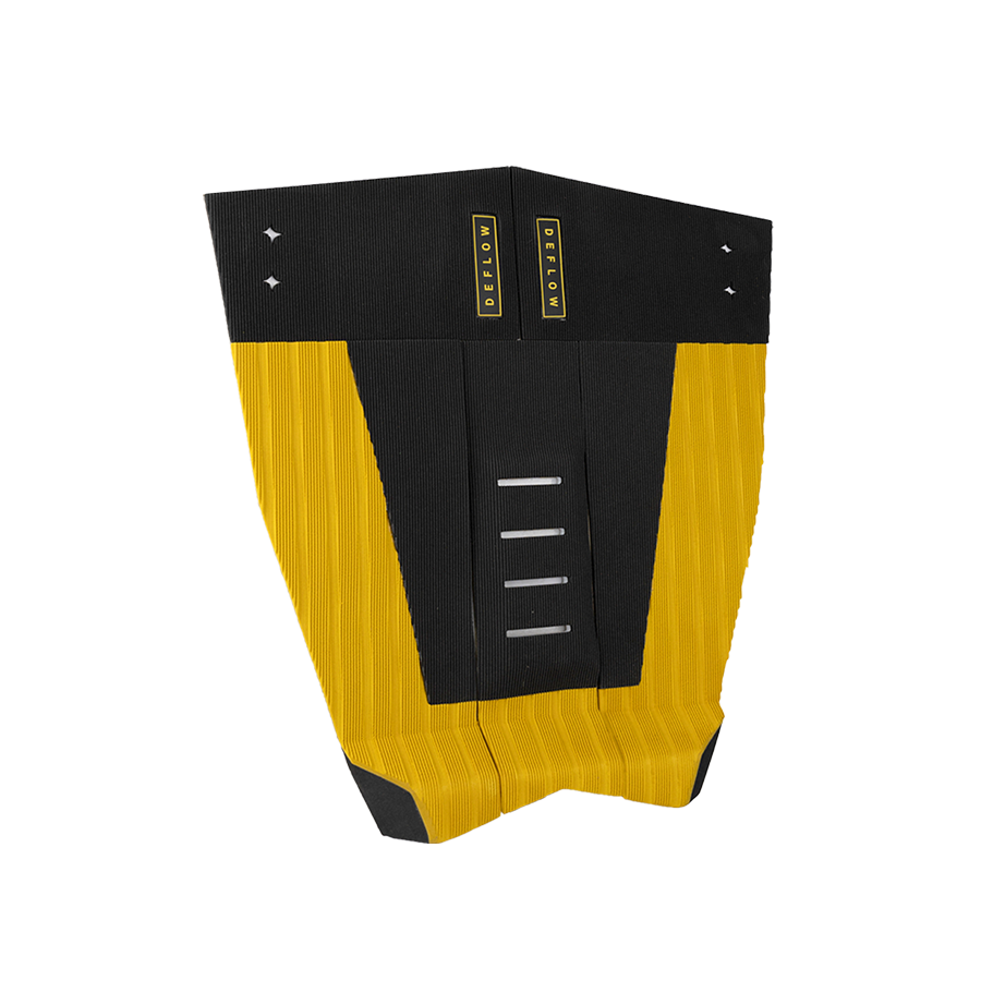 Vista lateral del grip Deflow 5 Piece Traction Mustard mostrando el kick de cola de 30 mm con ángulo de 50 grados y el arco central de 5 mm en tono amarillo mostaza terroso.