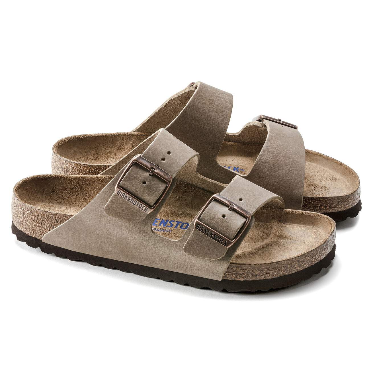 Birkenstock Arizona Plantilla Blanda Tobacco Brown, vista de suela EVA con dibujo de agarre y base de corcho natural en perfil.