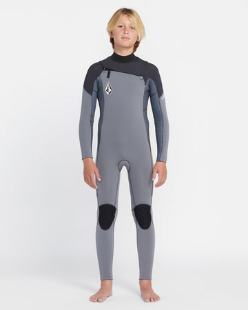 Traje de neopreno VOLCOM 4/3MM Chest Zip Fullsuit para niño en gris y negro, vista frontal, ideal para surf en aguas frías