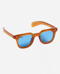 Gafas de sol Warmouth Eyewear Ron Ryan en color naranja translúcido con lentes azules – Vista lateral