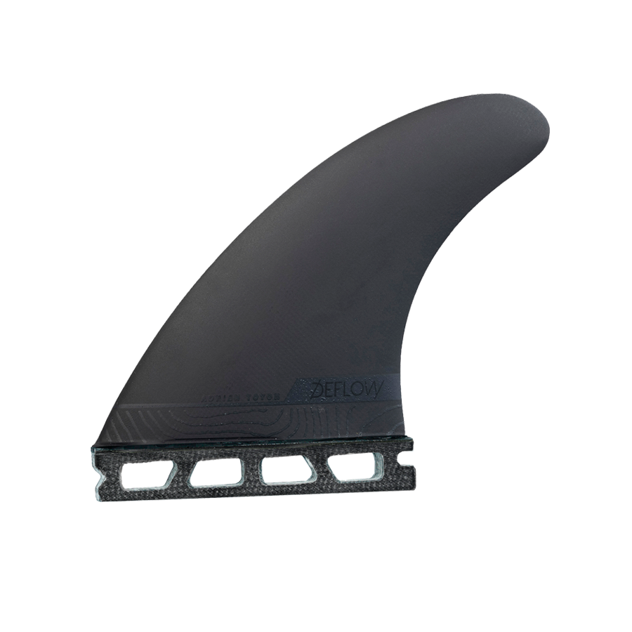 Quilla central Deflow Adrien Toyon Fiberglass Limited Edition negra en fibra de vidrio, vista lateral limpia con base Futures y perfil de rake pronunciado.