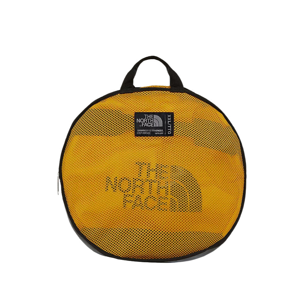 La Mochila The North Face Base Camp Duffel - S Amarilla se pliega en un disco fácilmente transportable