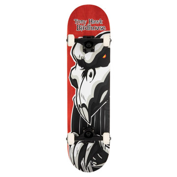 Base del skate completo Birdhouse Stage 3 Hawk Falcon 2 con tabla roja, halcón esquelético blanco y negro con ojo naranja, textos Tony Hawk y Birdhouse, trucks negros y ruedas blancas
