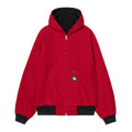 Vista frontal de la chaqueta Carhartt WIP 50 Years Anniversary OG Active Jacket color rojo con forro negro y cierre de cremallera dorada.