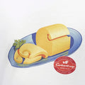 Detalle del estampado de la camiseta Carhartt WIP S/S Fromage: ilustración de una tabla de quesos sobre un plato azul con perejil, junto al parche rojo Carhartt WIP Specials 313-07621-061.