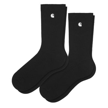 Calcetines Carhartt WIP negros de canalé con logo bordado blanco y diseño de caña media.