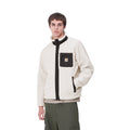 Hombre con la chaqueta forro polar Carhartt WIP Prentis Liner Blanca