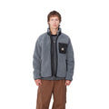 Hombre con la chaqueta forro polar Carhartt WIP Prentis Liner Gris