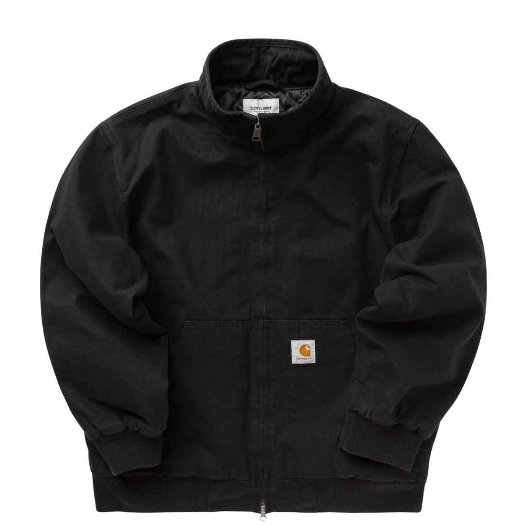 Chaqueta Carhartt WIP Ravon Jacket en color Black Heavy Stone Wash, vista frontal sin modelo.