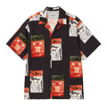 Carhartt WIP S/S Sean Hamilton Shirt Sean Hamilton Print Black vista frontal, camisa streetwear de manga corta con estampado gráfico integral, cuello bowling y cierre de botones en viscosa ligera.