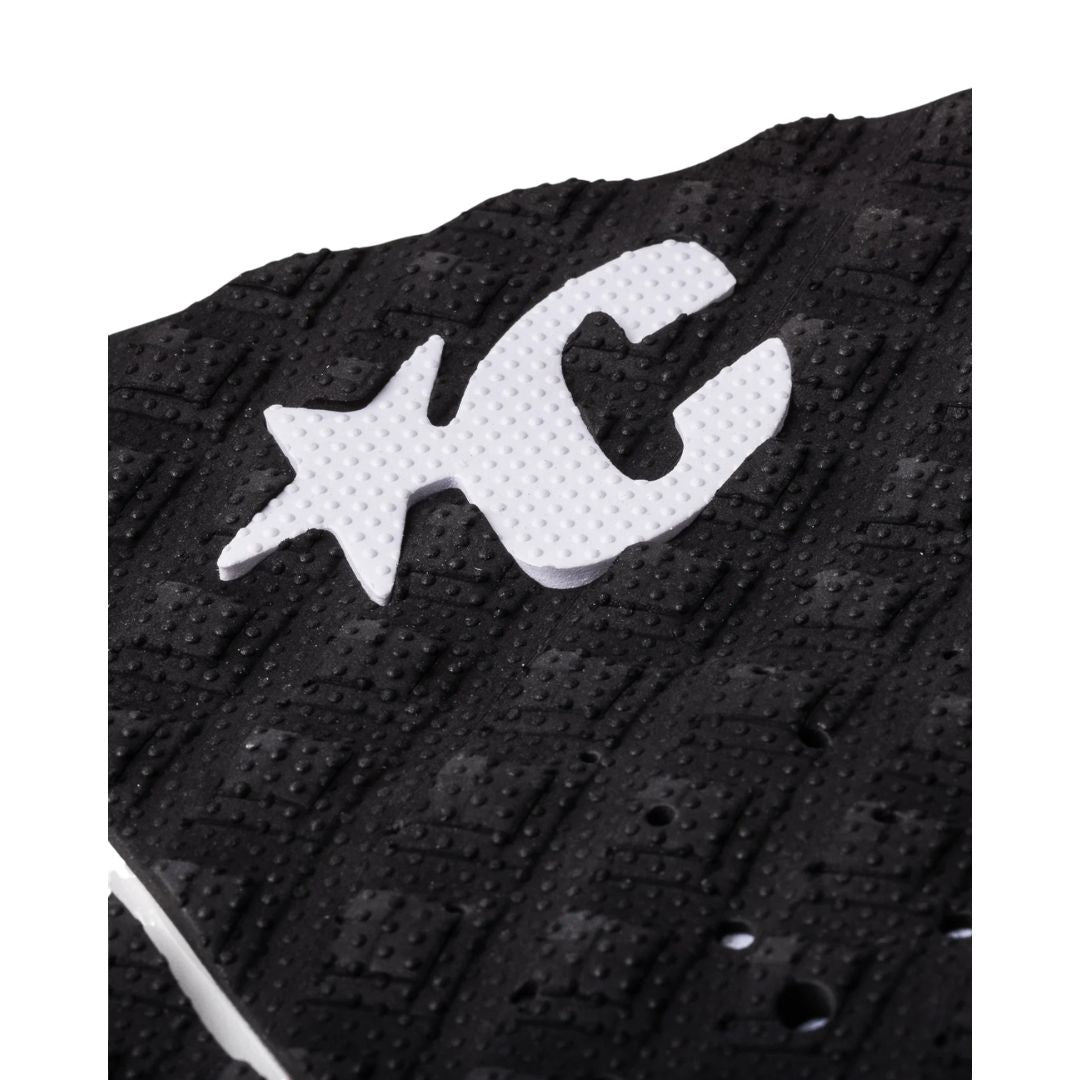 Detalle del patrón Thermo-Lite Diamond Loc II negro con micro-puntos y logo Creatures of Leisure blanco del grip Griffin Colapinto Signature.