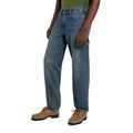 Vista tres cuartos de vaqueros Dickies 993 carpenter khaki tinted blue con corte recto tapered.