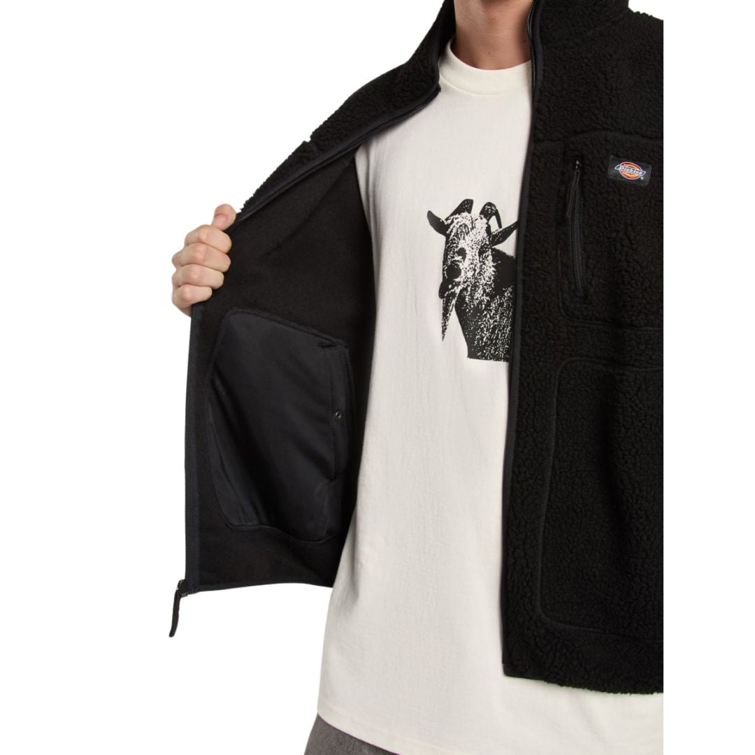 Detalle interior del forro polar Dickies Mount Hope Fleece color Black abierto mostrando bolsillo interior y textura de lana.