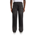 Pantalón Dickies Garyville Denim negro lavado desgastado, vista trasera en modelo de pie.