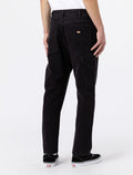 Hombre con los pantalones Dickies Carpenter Duck Canvas Negros posterior