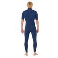 Vista trasera completa del traje Rip Curl E-Bomb 2/2 azul marino jaspeado sin cremallera, con costuras GB Seam visibles en espalda y cuello alto de neopreno negro.