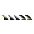 Set de quillas Firewire Velox talla Medium en acabado negro con acento verde, mostrando la plantilla rake trasera, quad y delantera del pack de 5.