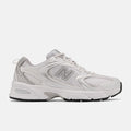 Zapatillas New Balance 530 en color blanco, vista lateral izquierda.