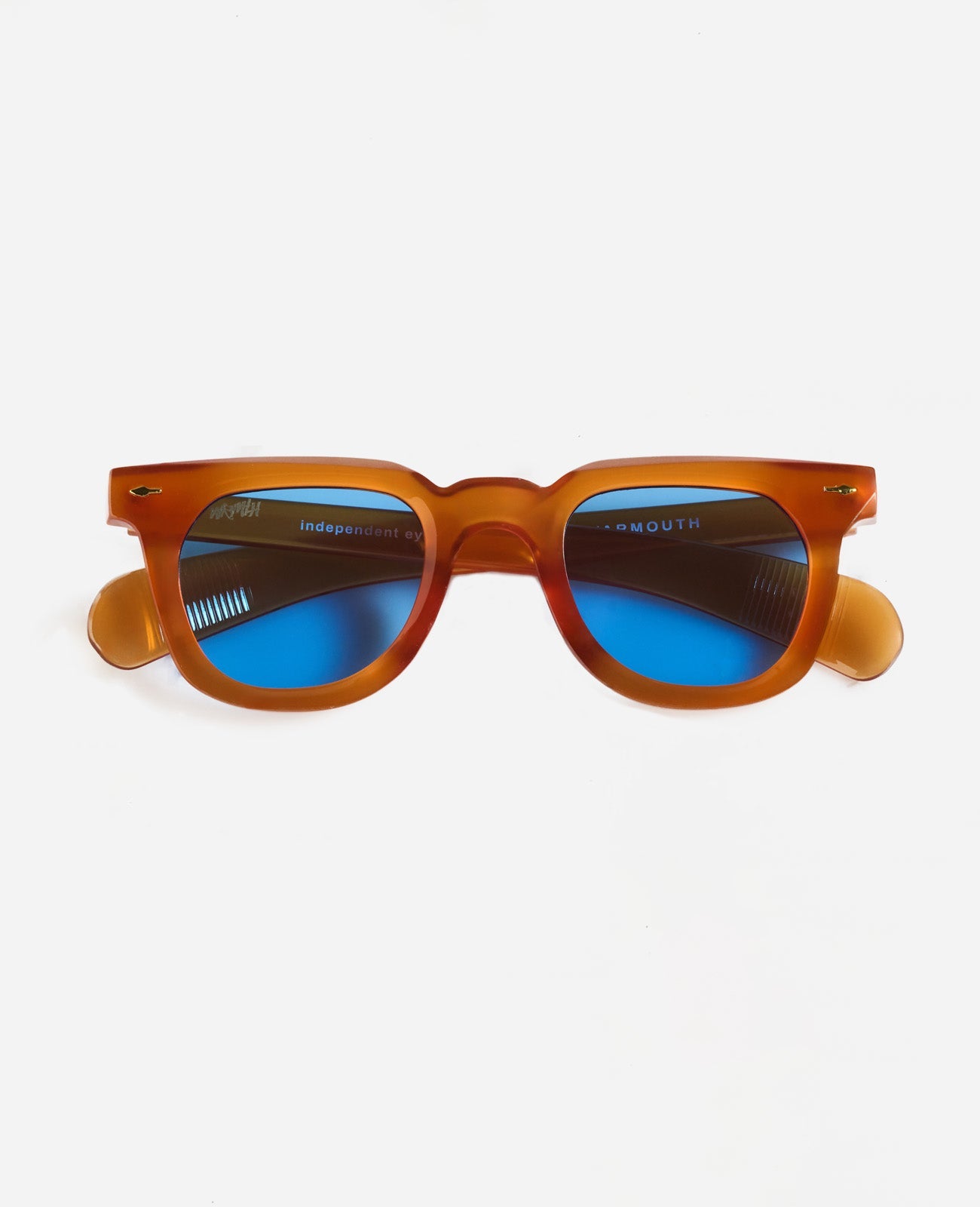 Gafas de sol Warmouth Eyewear Ron Ryan en color naranja translúcido con lentes azules – Vista frontal