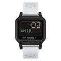 Reloj Nixon Heat Black White con temporizador digital activo en pantalla.