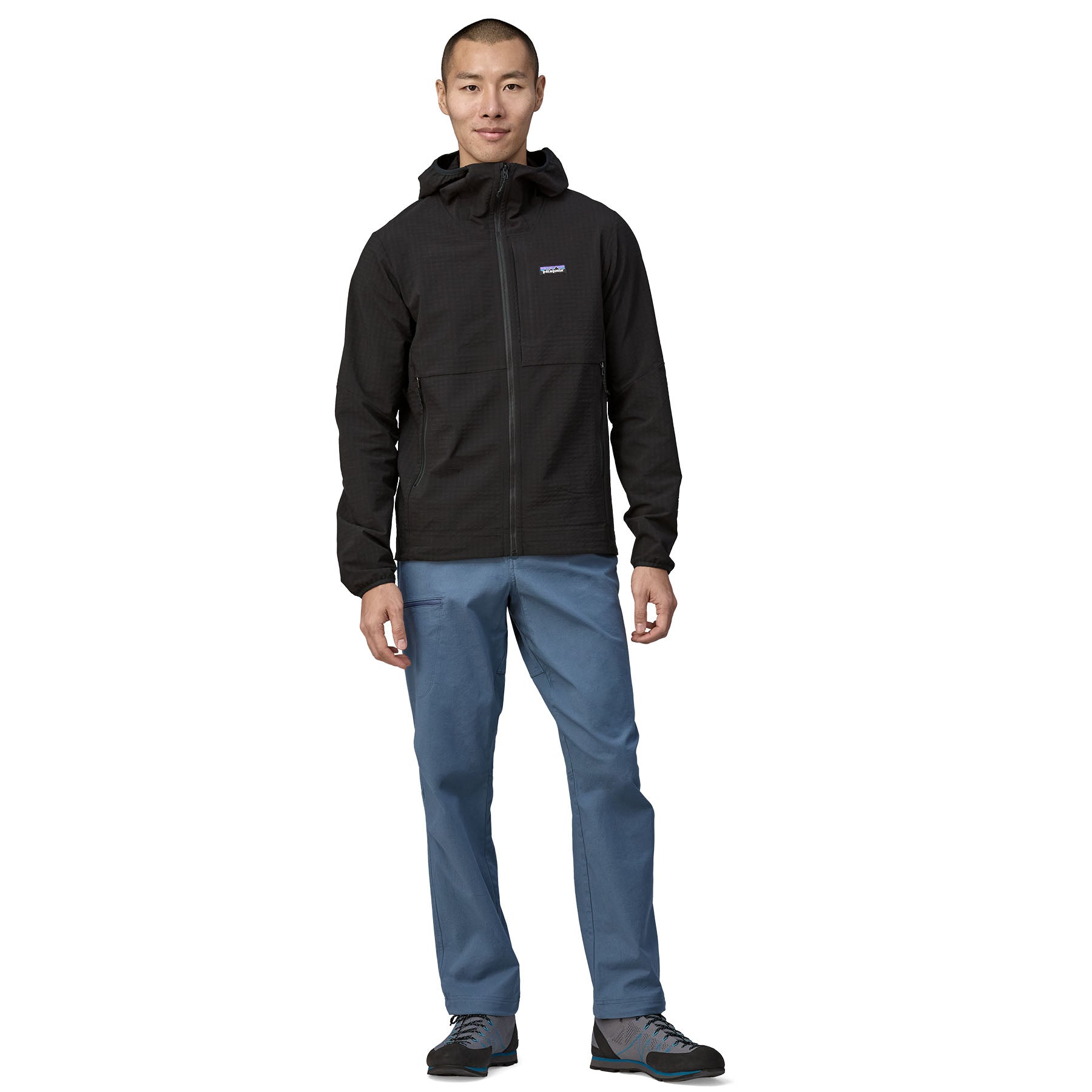 Vista completa de la chaqueta Patagonia Men's R1® TechFace Hoody en color negro, ideal para actividades al aire libre.