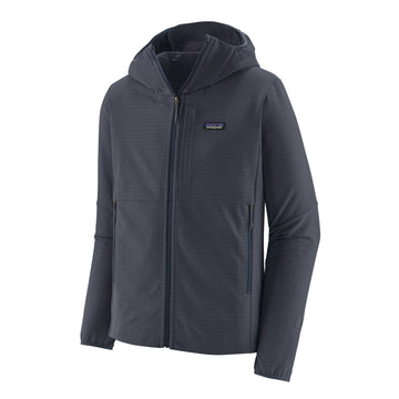 Vista detalle de la chaqueta Patagonia Men's R1® TechFace Hoody en color azu smolder, resaltando los materiales resistentes y la capucha ajustable.