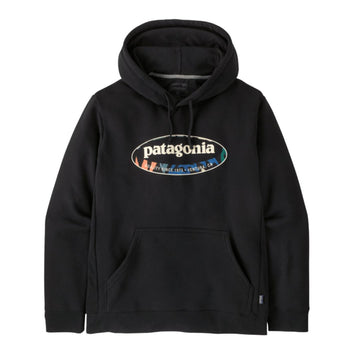 Patagonia M's '95 Oval Logo Uprisal Hoody en color negro Black con gráfico Kaleido — vista frontal con logo ovalado '95 estampado en serigrafía multicolor (blanco, azul, naranja y verde) con texto "Quality Since 1973 · Ventura, CA", capucha con cordón ajustable y bolsillo canguro calientamanos.
