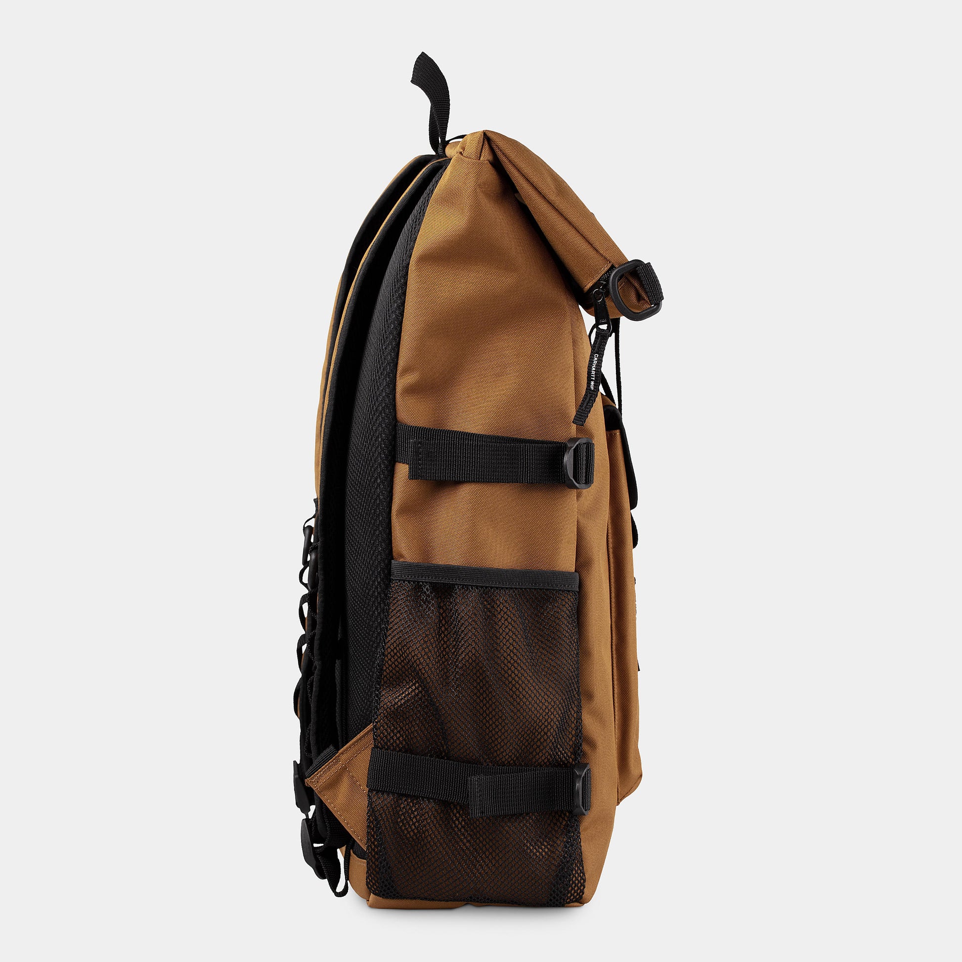 CARHARTT WIP Philis Backpack Hamilton Brown, vista lateral izquierda mostrando bolsillo de malla y diseño funcional.