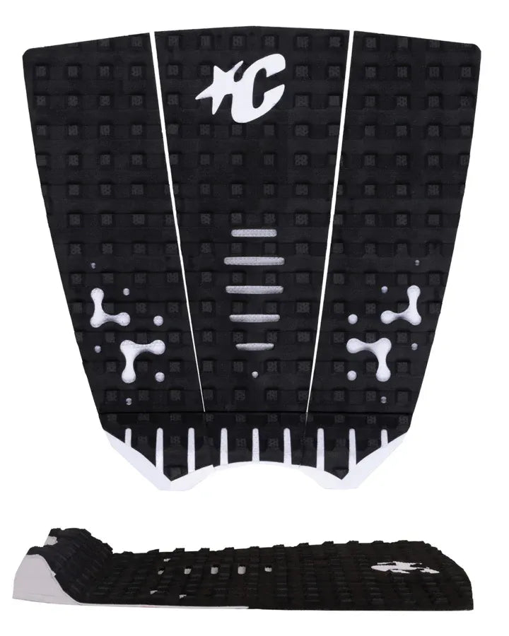 Detalle de los cortes estratégicos LOC-LITE negros en el patrón Square Loc blanco del grip de surf Creatures Mick Fanning Signature white black para máximo contacto del pie.