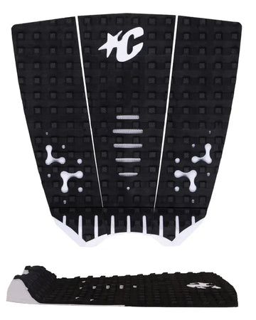 Detalle de los cortes estratégicos LOC-LITE negros en el patrón Square Loc blanco del grip de surf Creatures Mick Fanning Signature white black para máximo contacto del pie.