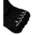 Detalle de la puntera de los calcetines Rip Curl Brand Crew Sock en negro, con el logotipo 