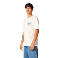 Rip Curl Bells Pro 26 Bell Logo S/S Tee camiseta surf color bone vista lateral con gráfico frontal Bells Beach.