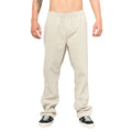 Vista frontal del pantalón Rip Curl Classic Surf Double Cord en color hueso, corte holgado y estilo casual.