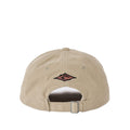 Rip Curl Diamond 2.0 Adj Cap en color khaki sand, vista posterior que muestra el diamante Rippy bordado en la parte trasera y el cierre ajustable con hebilla metálica sobre la pana beige.