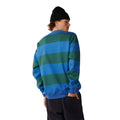 Sudadera Rip Curl Disorder Stripe Crew en Riverside, vista trasera, mostrando las rayas anchas en bloque a lo largo de espalda y mangas.