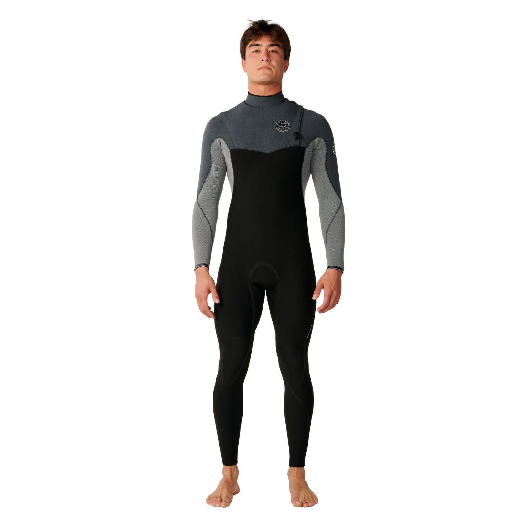 Traje de neopreno RIP CURL FLASHBOMB PRO 4/3 ZIP FREE en Charcoal Grey, vista frontal completa. Diseño sin cremallera con yugo superior gris antracita y mangas jaspeadas para máxima flexibilidad en el agua.