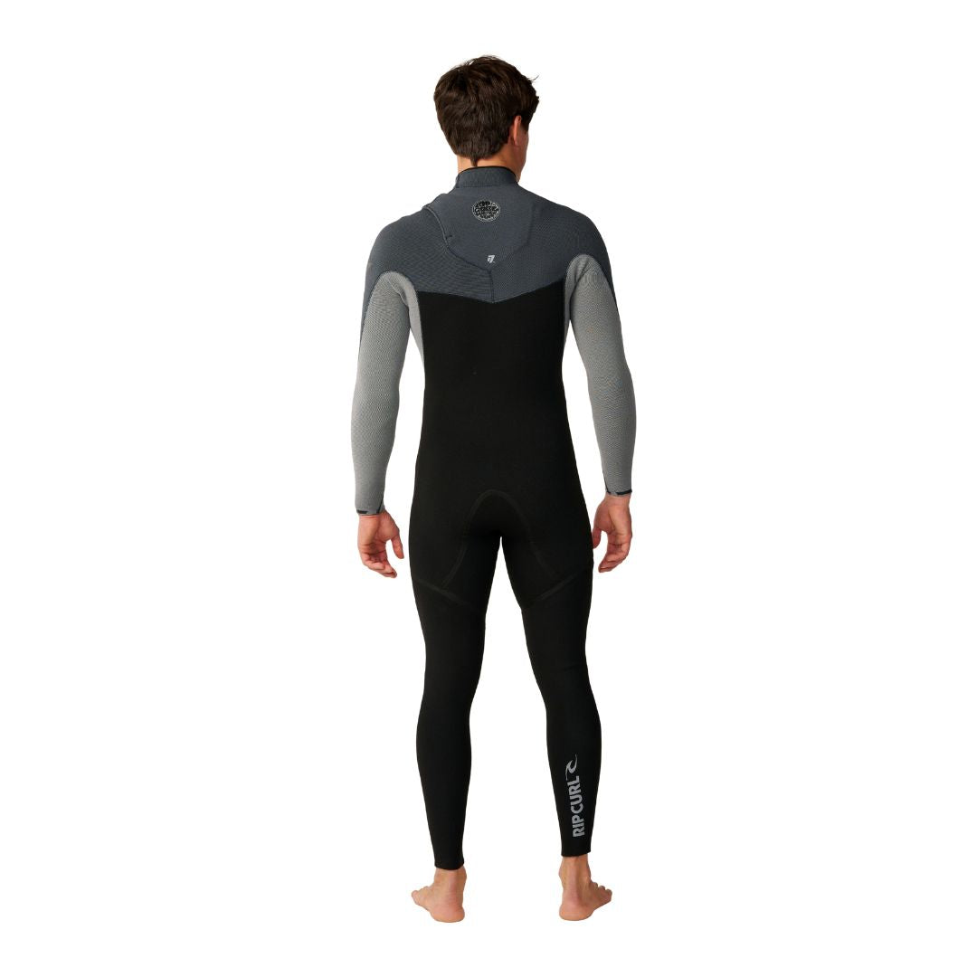 Traje de surf RIP CURL FLASHBOMB PRO 4/3 ZIP FREE en Charcoal Grey, vista trasera completa sin cremallera, con logotipo RIP CURL en la pantorrilla y panel superior en gris antracita jaspeado.