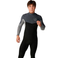 Traje de surf RIP CURL FLASHBOMB PRO 4/3 ZIP FREE en Charcoal Grey, vista frontal en ángulo mostrando el sistema de entrada sin cremallera y el logotipo RIP CURL en el pecho para un ajuste hermético.