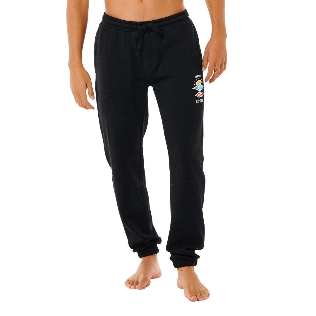"Pantalón de chándal Rip Curl Icons of Surf en color negro con logotipo gráfico en la pernera, estilo holgado para hombre.