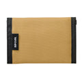 Rip Curl Icons Of Surf Wallet cartera plegable Golden Hour exterior con etiqueta Rip Curl.