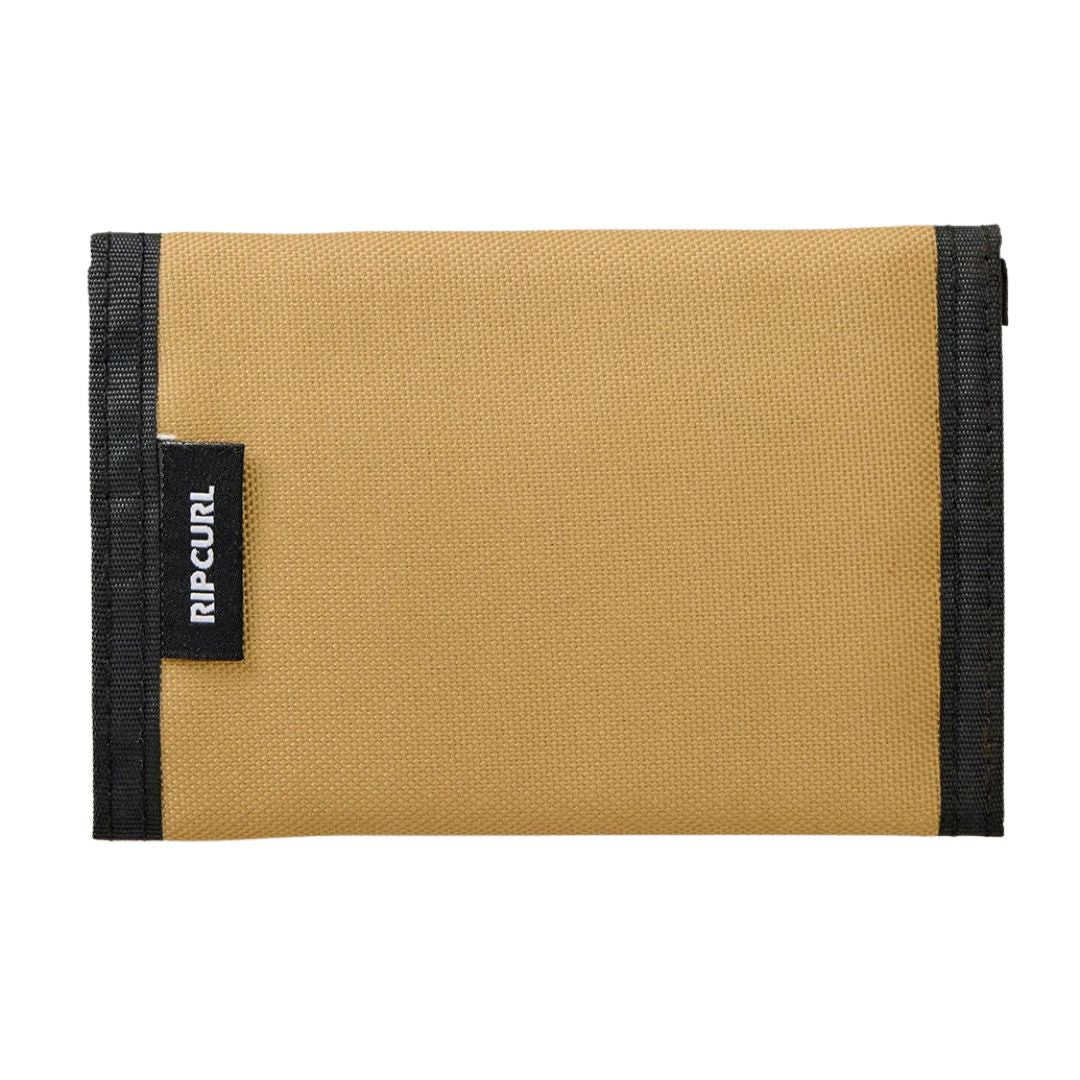 Rip Curl Icons Of Surf Wallet cartera plegable Golden Hour exterior con etiqueta Rip Curl.