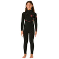 Niña con traje de neopreno Rip Curl Kids F-Bomb Fusion 4/3mm negro, vista frontal con cremallera en el pecho.