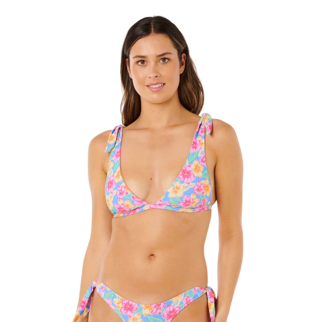 Top bikini escote V profundo Rip Curl Malibu Cove Deep V blue, vista frontal con estampado yardage floral azul integral y tirantes con lazos en hombros.