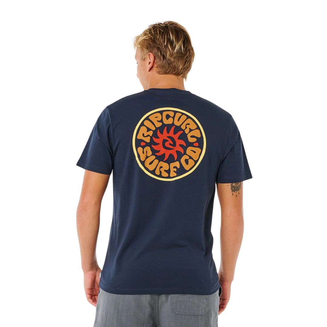 RIP CURL Pacific Rinse Circle camiseta de manga corta azul marino vista trasera con gráfico circular grande.