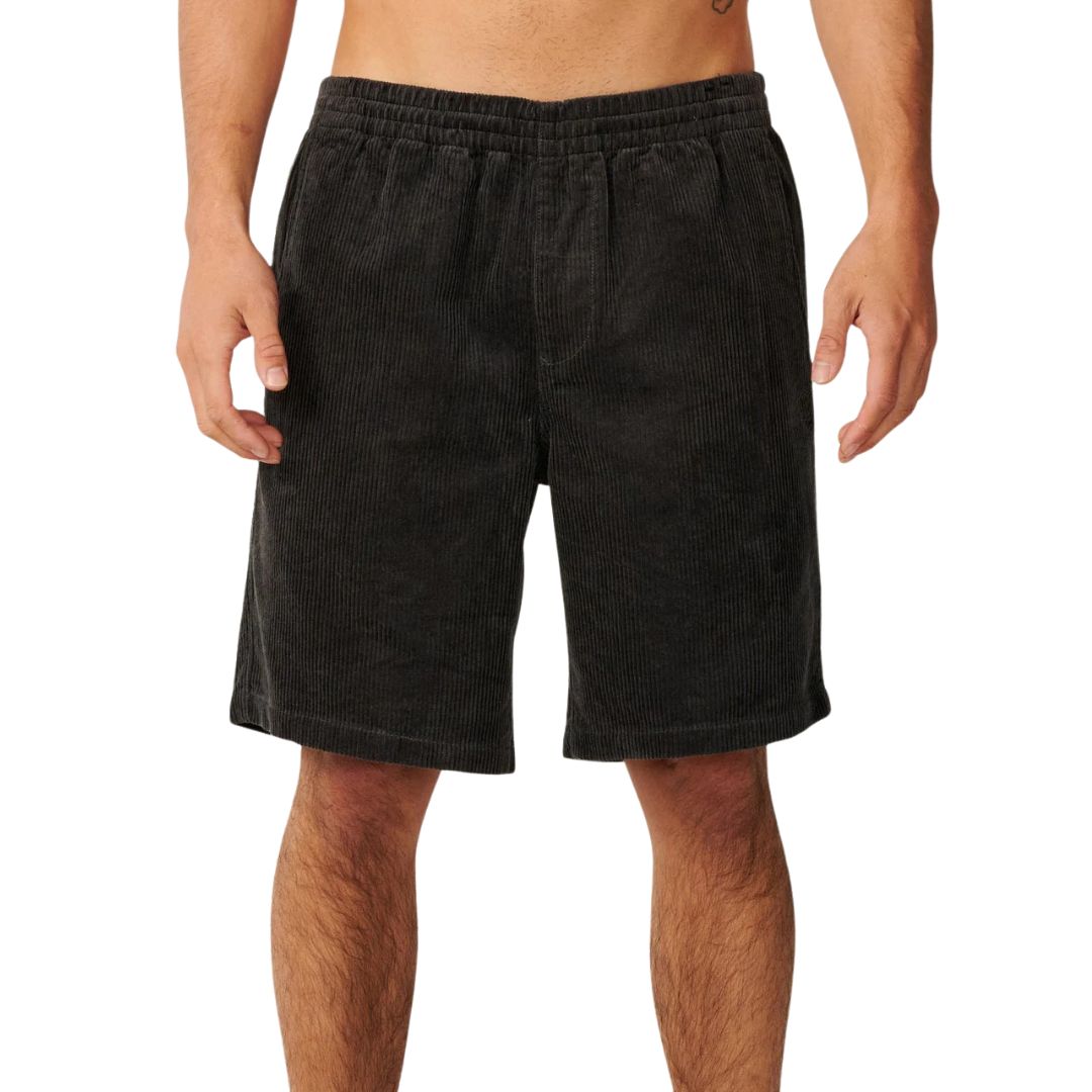 Pantalón corto pana Rip Curl Premium Surf Cord negro, vista frontal con cintura elástica, bolsillos laterales y textura acanalada acid wash loose fit.