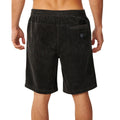 Pantalón corto pana Rip Curl Premium Surf Cord negro, vista trasera con bolsillo de ojal, etiqueta tejida circular Rip Curl y cintura elástica acid wash.