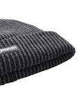 Detalle del punto y etiqueta Search del Gorro Rip Curl Search Chunky Regular Beanie Negro